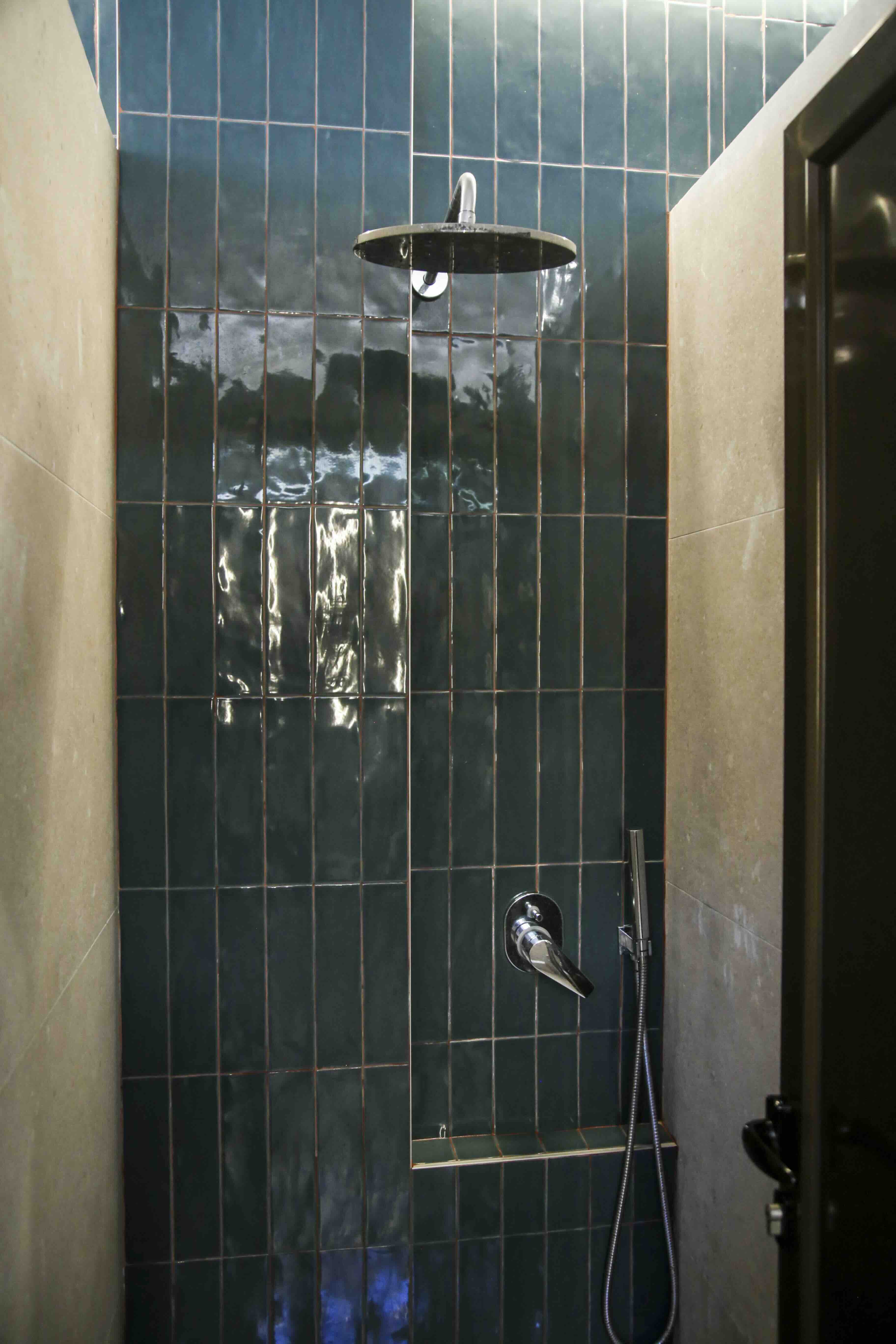 Individual rain shower cabins at Erodios Camping